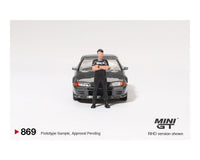 Mini GT #869 Nissan GT-R R32 Gunmetal W/ Matsuda figure